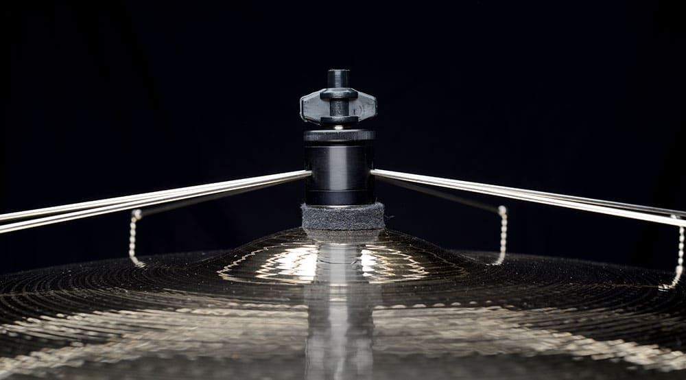 Close-up view of Jaspercussion Cymb Siz adjustable chain sizzler attachment’s mounting hardware, including wing nut and specially-designed jam nut that holds it in the position which suits your playing style.